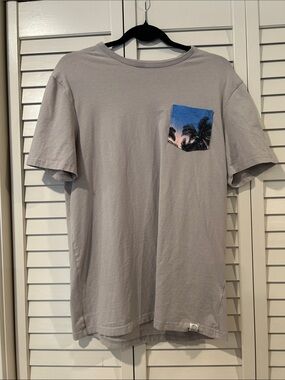 Free Planet Beige Short-Sleeve Tee with Blue Tropical Pocket Size M